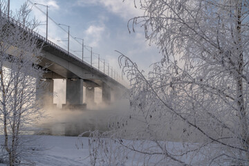 Wall Mural - Winter view of the Academic bridge across the Angara in Irkutsk city