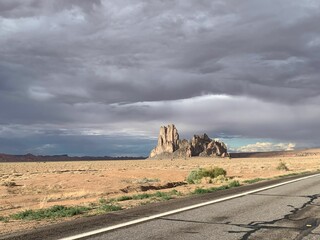 Poster - Asphalt highway in Verde Valley road with Grand Canyon on the horizon, Arizona with blue cloudy sky