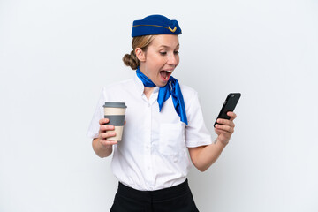 Wall Mural - Airplane blonde stewardess woman isolated on white background holding coffee to take away and a mobile