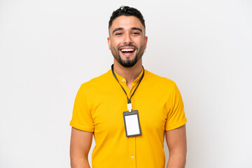 Young Arab man with ID card isolated on white background with surprise facial expression