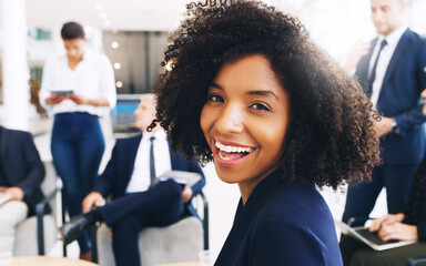 Smile, happy and portrait of black woman at startup meeting for corporate workshop, diversity and networking project. Teamwork, confident and proud afro woman in lounge with men and women in office.