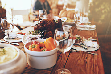 Table, turkey and meat food for thanksgiving, Christmas and family lunch, dinner party and home celebration in dining room. Background, feast and roasted chicken dish, eating meal and holiday event