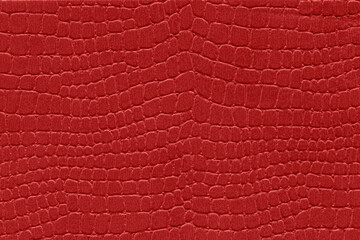 Red reptile skin. crocodile leather texture background