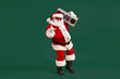 © deagreez - Full size photo of grey white hair bearded santa claus show horned symbol hold boom box on x-mas christmas party wear headwear cap isolated bright shine color background