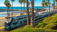 Metro Commuter Train Entering San Clemente Pier Beach Station In Southern California