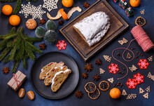 Delicious Festive New Year's Pie With Candied Fruits, Marzipan And Nuts On A Dark Concrete Background