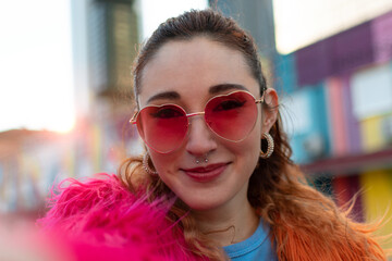 selfie time. close-up of charming confident and stylish caucasian blond woman in trendy pink sunglas