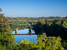 Shepherdstown Pike Bridge With Reflection Over A Calm  Potomac River With Clear Blue Sky In Shepherdstown, WV, Seen From The Rumsay Monument.