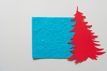 Wall Mural - holiday tree shape and textured blue paper