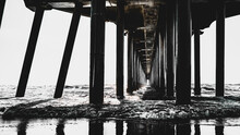 Monochromatic Pier Underside, Abstract Geometry Of Huntington Beach Pier At Low Tide In California