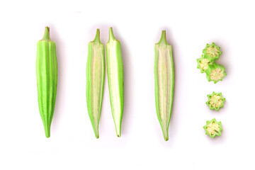 Wall Mural - Fresh okra with slice isolated on white background , top view , flat lay.