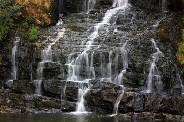 Elephanta Falls, Meghalaya
The Elephant Falls are a two-tier waterfall in Shillong, Meghalaya, India The mountain stream descends through two successive falls set in dells of fern-covered rocks.