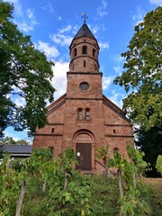 Poster - Beautiful vertical shot of Evangelical Church in Lorsch, Germany under blue sky