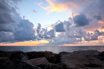 Wall Mural - picturesque view of sky with heavy rainy clouds over sea