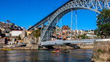 Placed Along The Douro River And Extending With It Until The Atlantic Ocean, Porto Is A Wonderful Town. Ribeira Do Porto Is One Of Its Oldest Zones With Interesting Bridges And Colourful Buildings