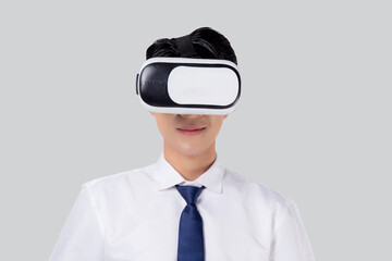 Experience of young asian businessman wearing VR Headset with excited isolated on white background, metaverse or virtual reality tech, innovation of futuristic, business and technology concept.