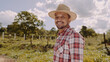 © Nexa - Portrait of young farmer man in the casual shirt and hat in the farm