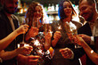 © maxbelchenko - Sparkling sparklers in the hands of friends.Group of people holding sparklers at party. Winter holidays, vacation, relax and lifestyle concept.