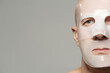© TrueFrame Collective - Copyspace studio portrait shot of adult man with hydrogel collagen mask on face