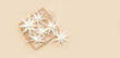 Merry Christmas.Christmas stars handmade light beige background.Monochrome,Christmas background,holiday card.DIY christmas flat lay copy space.Christmas zero waste, paper, eco postcard