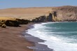 Beautiful shot of a red sand beach in the Paracas National Park, Peru