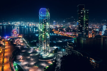 Wall Mural - Aerial night view of Batumi city resort embankment in historical town, Georgia.