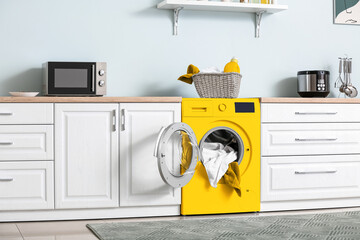 Sticker - Interior of kitchen with modern yellow washing machine