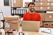 © Krakenimages.com - Young hispanic man smiling confident working at storehouse