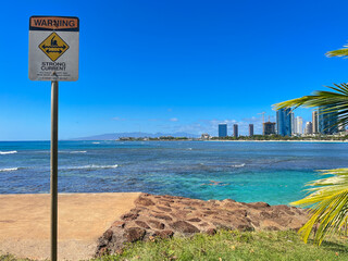 Wall Mural - Warning signboard in a beach