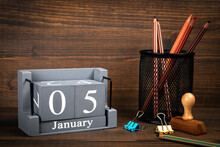 5 January Inscription On Wooden Calendar. Wooden Office Desk