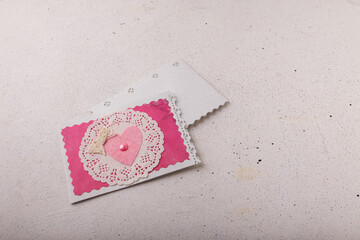 Wall Mural - 14 February Valentines day postcard with pink heart on white background