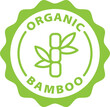 © Revolutionizzed - organic bamboo green stamp. Symbol, outline icon, tag, badge, label, circle, green white vector round isolated on transparent background.