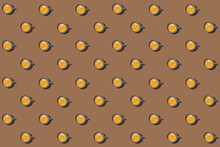 Pattern Of Cups Of Coffee Standing In Rows Against Brown Background