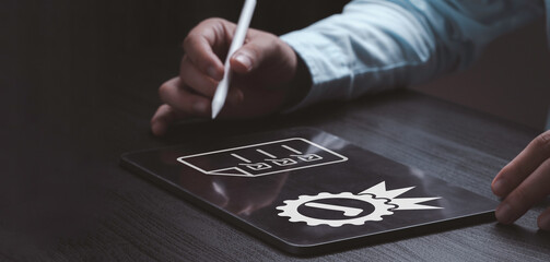 Fototapete - Businessman using tablet with quality assurance and document icon for ISO or International Standard Organisation which related quality control and continuous improvement concept.