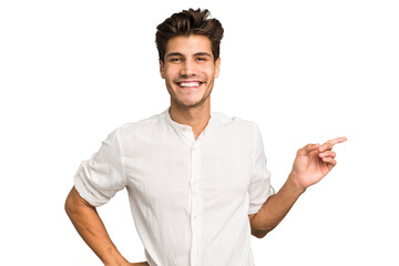 Poster - Young caucasian handsome man isolated smiling cheerfully pointing with forefinger away.