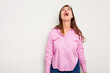© Asier - Young caucasian cute woman isolated on white background shouting very angry, rage concept, frustrated.
