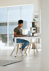 Canvas Print - Black woman, laptop and working in home office for startup business entrepreneur, work from home expert or remote research manager. African girl, typing email or seo employee on computer at home