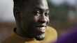 © Marco - Happy black African man smiling and laughing portrait face close-up