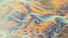 Aerial View Of Abstract Water Formation Near Olfusa River Bank In Iceland.
