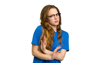 Young caucasian redhead woman isolated doing a denial gesture