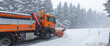 © Anselm - snow plow truck clearing the mountain road in a snow storm