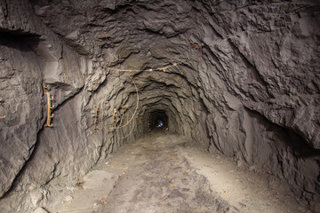 Canvas Print - Underground abandoned gold iron ore mine shaft tunnel gallery passage