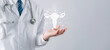 © Kiattisak - doctor in a white coat holding virtual uterus reproductive system , woman health, PCOS, ovary gynecologic and cervix cancer, Healthy feminine concept