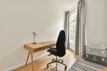 Desk With Chair At Wall