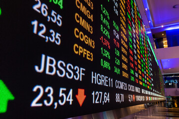 Sao Paulo, Brazil, November 22, 2022. Display with stock quotes in the modern visitor center of B3, Brasil, Bolsa, Balcao, in the headquarters of BOVESPA, Sao Paulo Stock Exchange, in downtown city