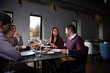 © Daniel - Group of Happy friends having lunch in the restaurant