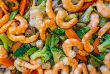 Looking Down At Chop Suey With Prawns, Broccoli And Cauliflower, An Asian Dish At A Help Yourself Buffet.