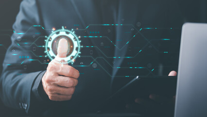 Wall Mural - cybersecurity management with online authentication technology , a businessman scans his fingerprint