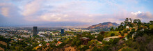 Universal City Skyline Sunset Cityscape Over Mulholland Scenic Drive In Hollywood, Los Angeles, California, Dramatic Cloudscape, Smog, And Hills