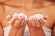 © Azee Jacobs/peopleimages.com - Beauty, skincare with woman and hands with soap or cream in facial zoom, body treatment and moisturizer for healthy skin. Cosmetic product, grooming and hygiene with foam or lotion close up.